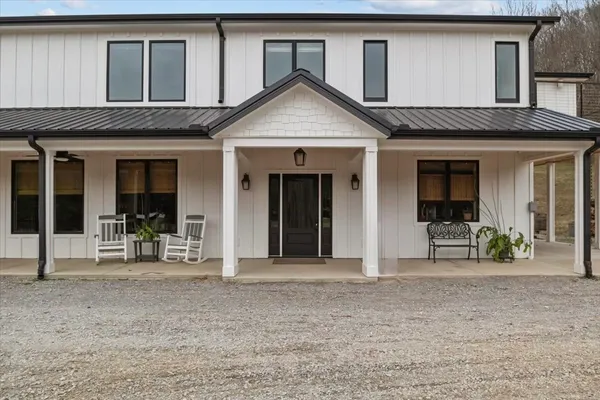 a dining room with furniture and garden view