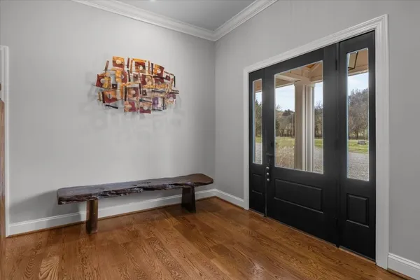 a kitchen that has a lot of cabinets in it and appliances