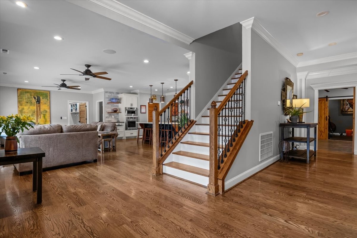 1355 Mitchell Road Pulaski, TN 38478 - Photo 9 of 95 a living room with furniture and wooden floor