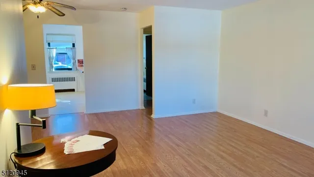 a workspace with furniture and a lamp