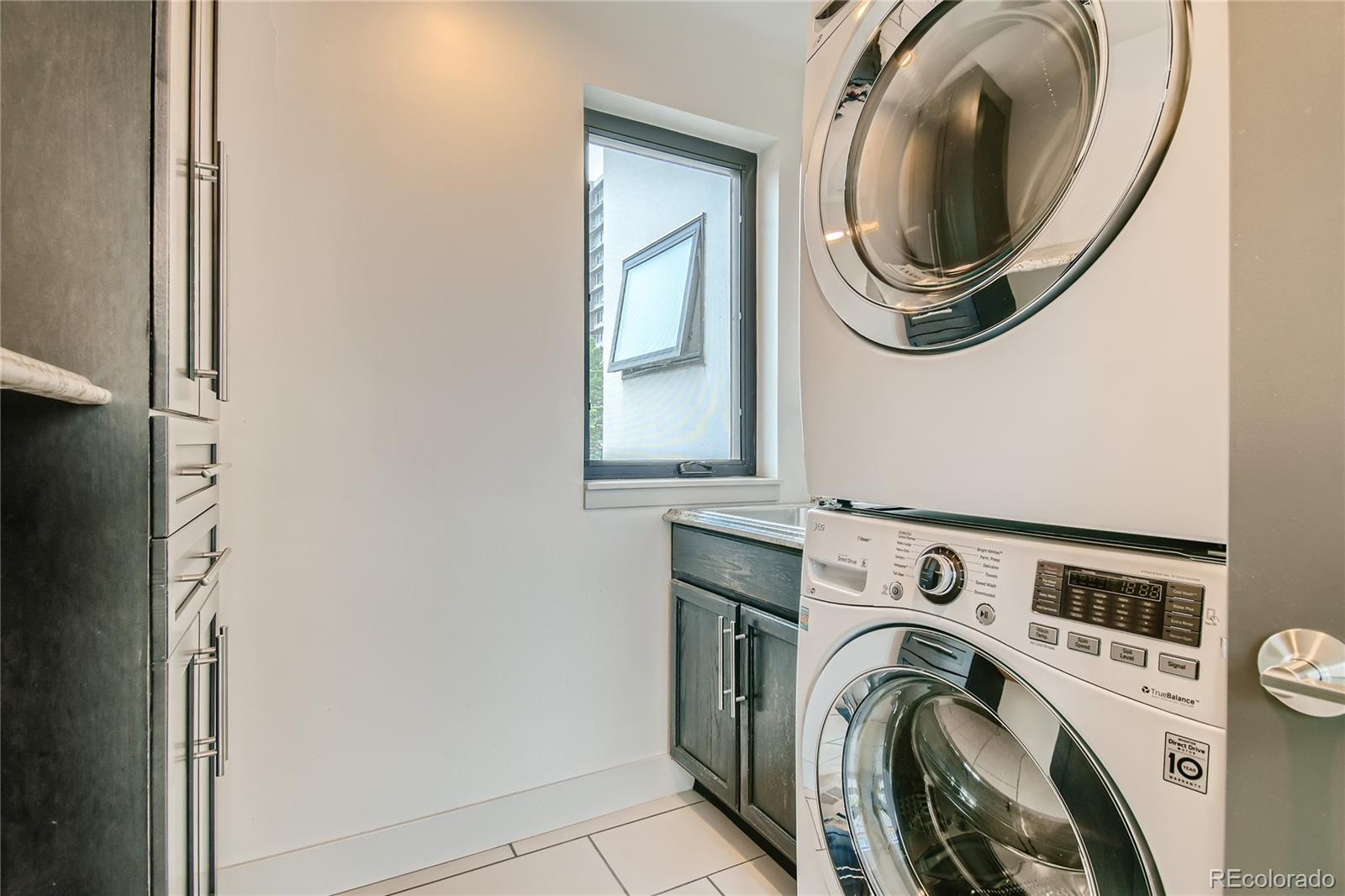 1609 Xavier Street Denver, CO 80204 - Photo 24 of 36 a utility room with dryer and washer