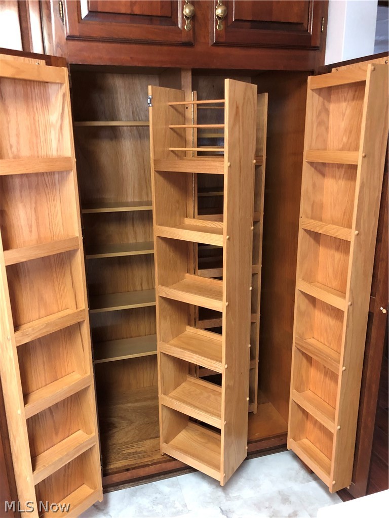 63333 Johnson North Road Bethesda, OH 43719 - Photo 6 of 35 Large pantry with pull out/swinging doors