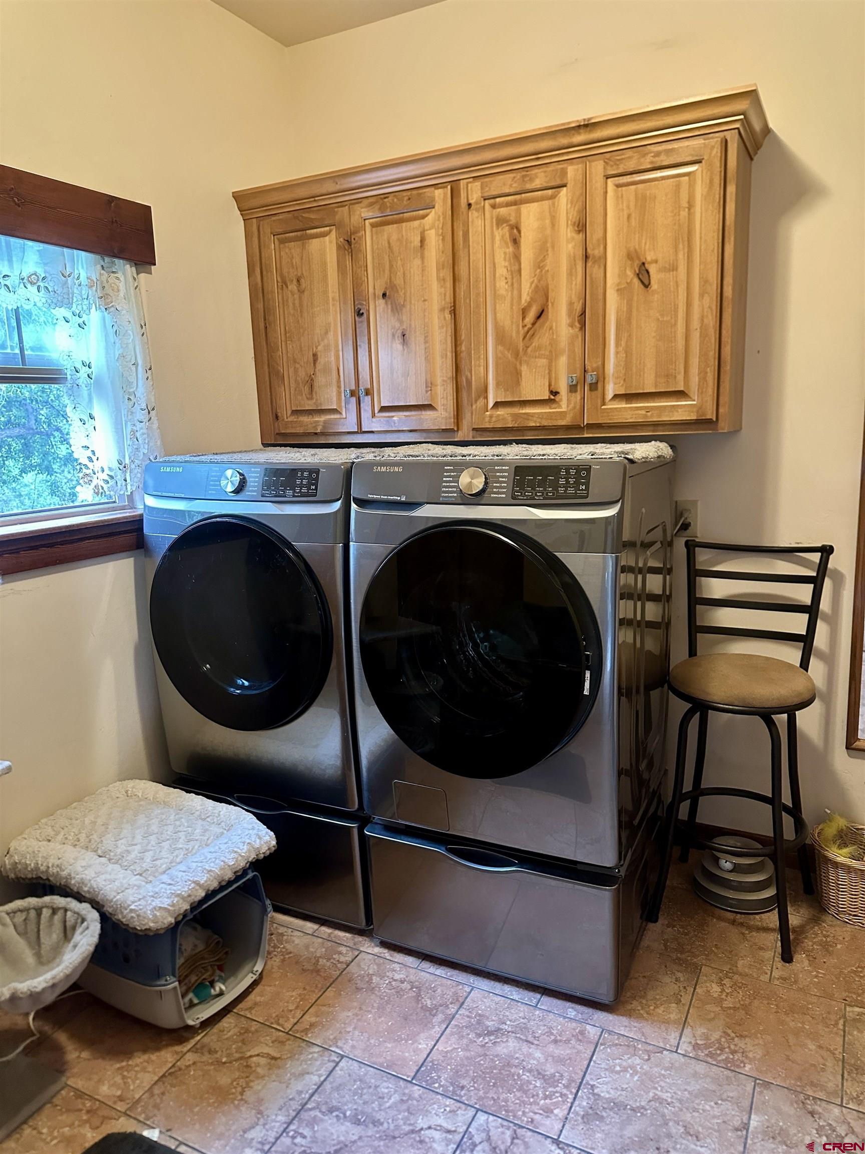 515 Southeast 2nd Street Cedaredge, CO 81413 - Photo 23 of 35 a living room with furniture and a fireplace