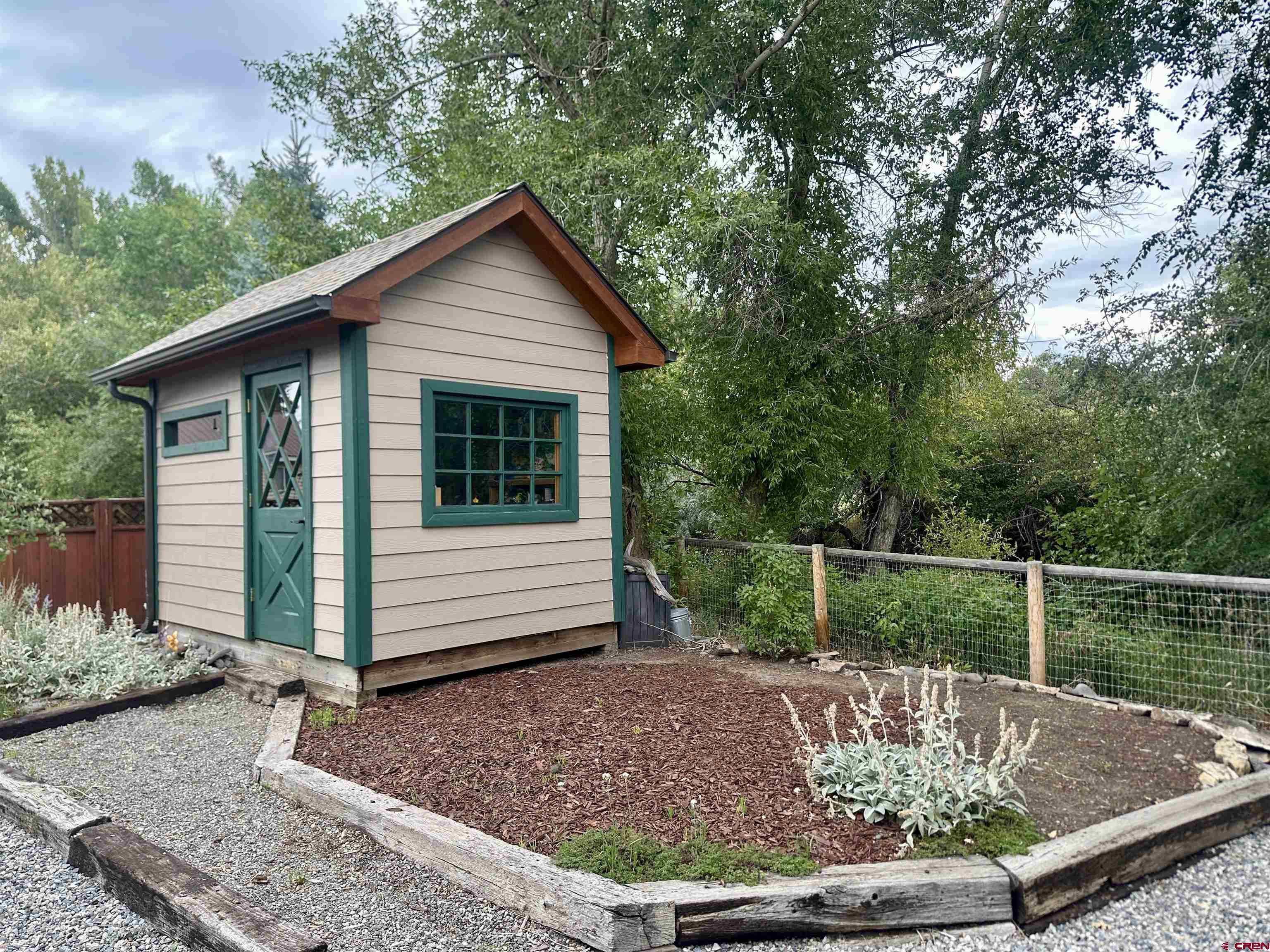 515 Southeast 2nd Street Cedaredge, CO 81413 - Photo 25 of 35 a view of house with backyard outdoor seating