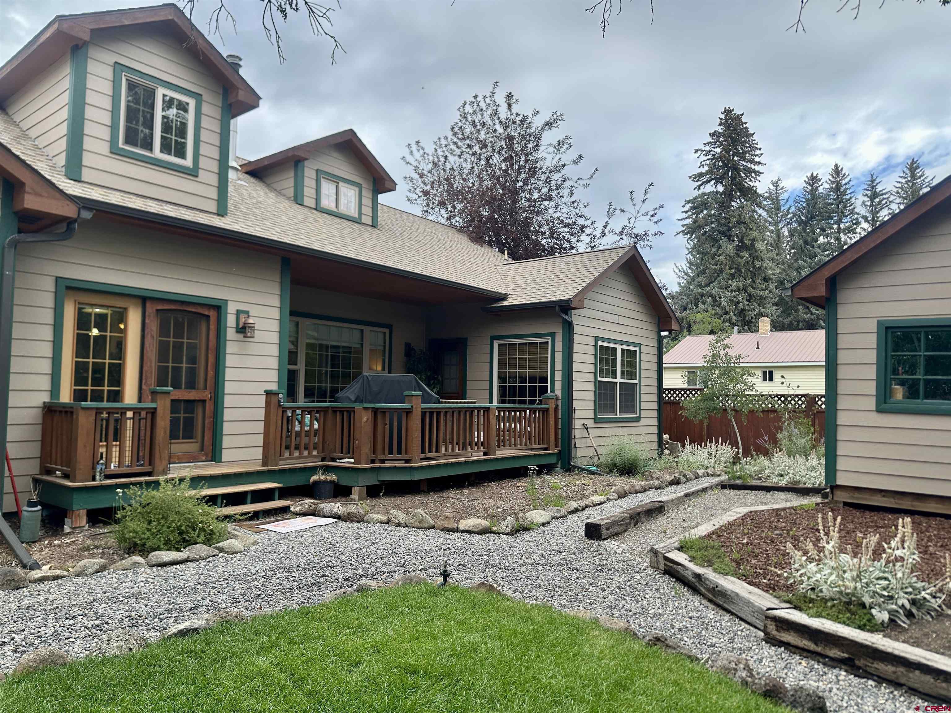 515 Southeast 2nd Street Cedaredge, CO 81413 - Photo 27 of 35 a front view of a house with garden