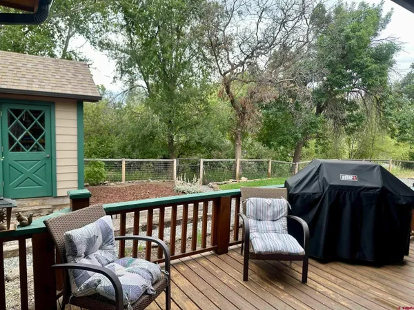 a view of a house with porch and wooden floor
