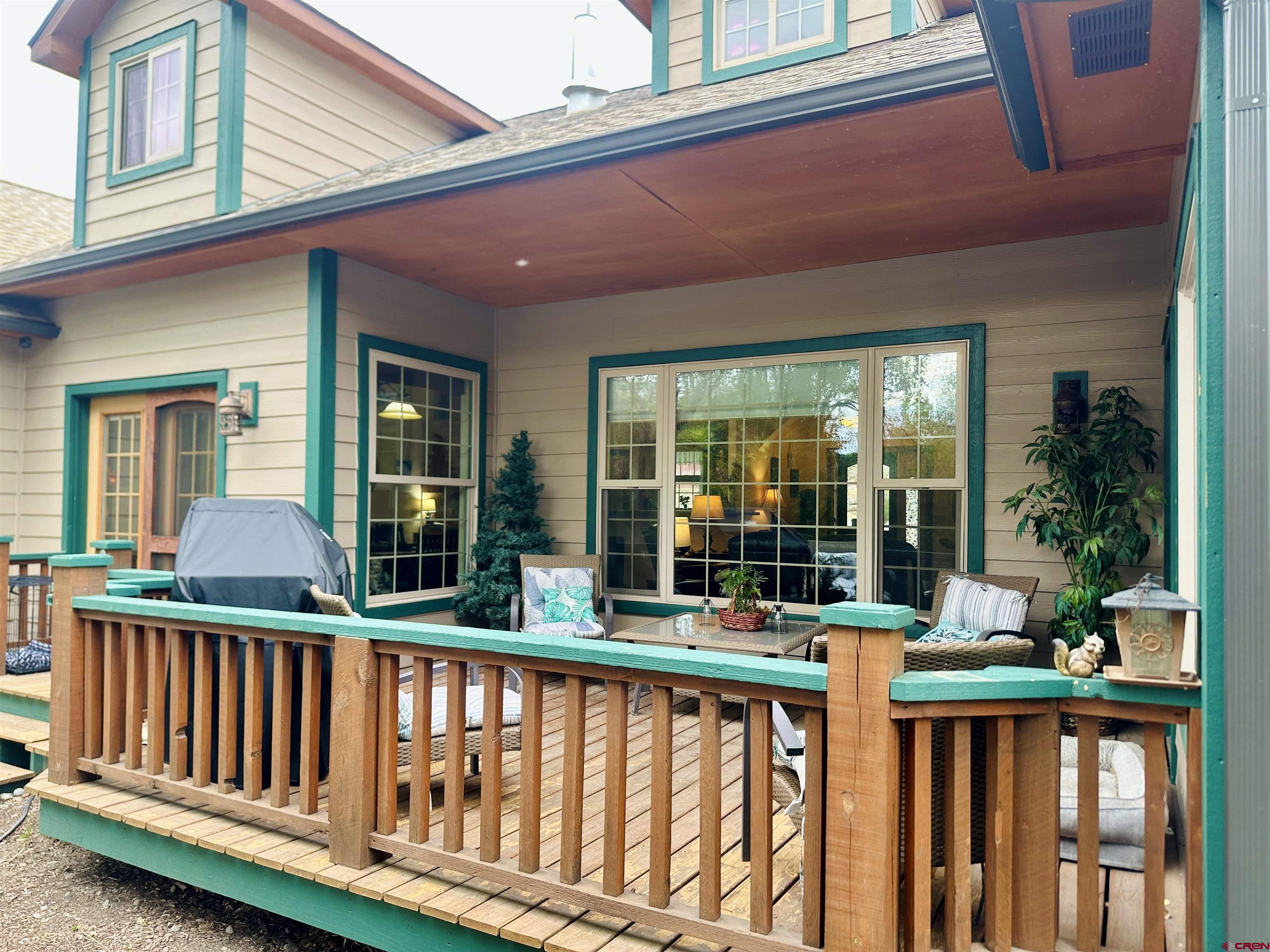 515 Southeast 2nd Street Cedaredge, CO 81413 - Photo 30 of 35 a view of a house with porch and wooden floor