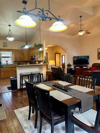 a view of a dining room with furniture