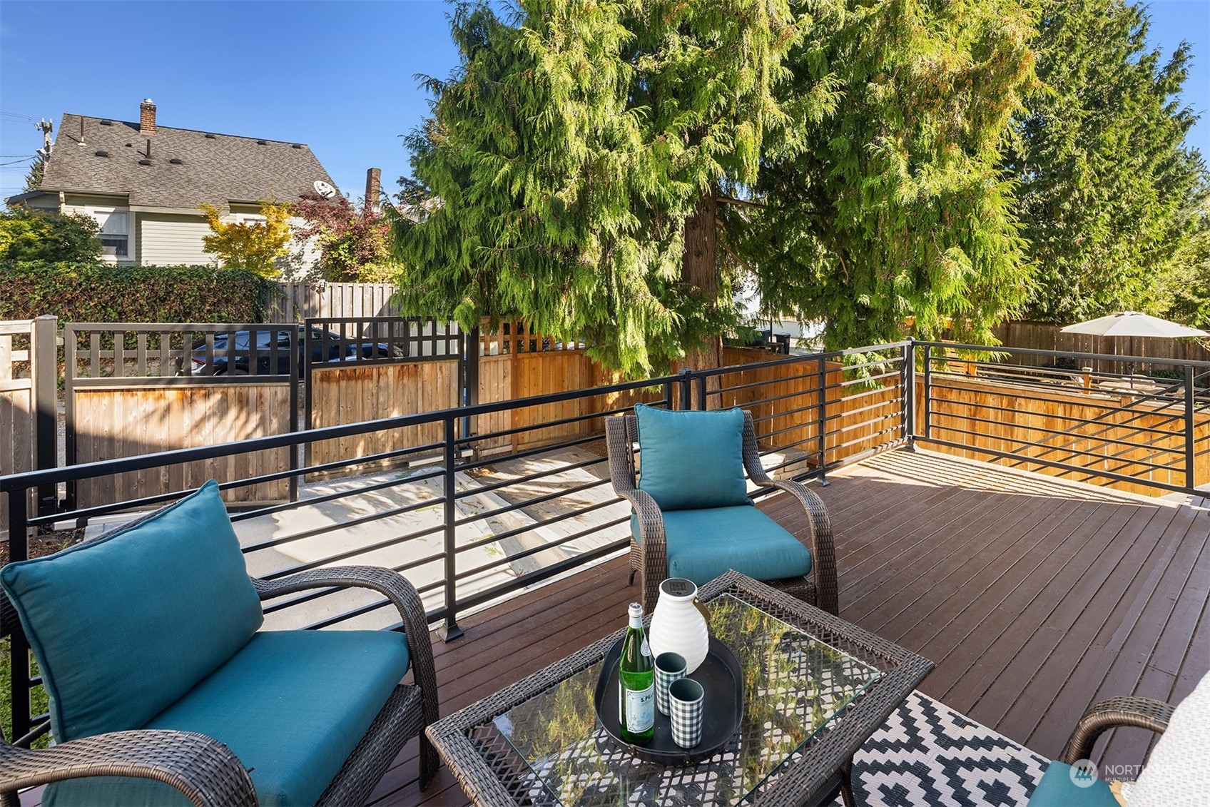 1112 North 76th Street Seattle, WA 98103 - Photo 15 of 40 a view of a chairs and table in the balcony