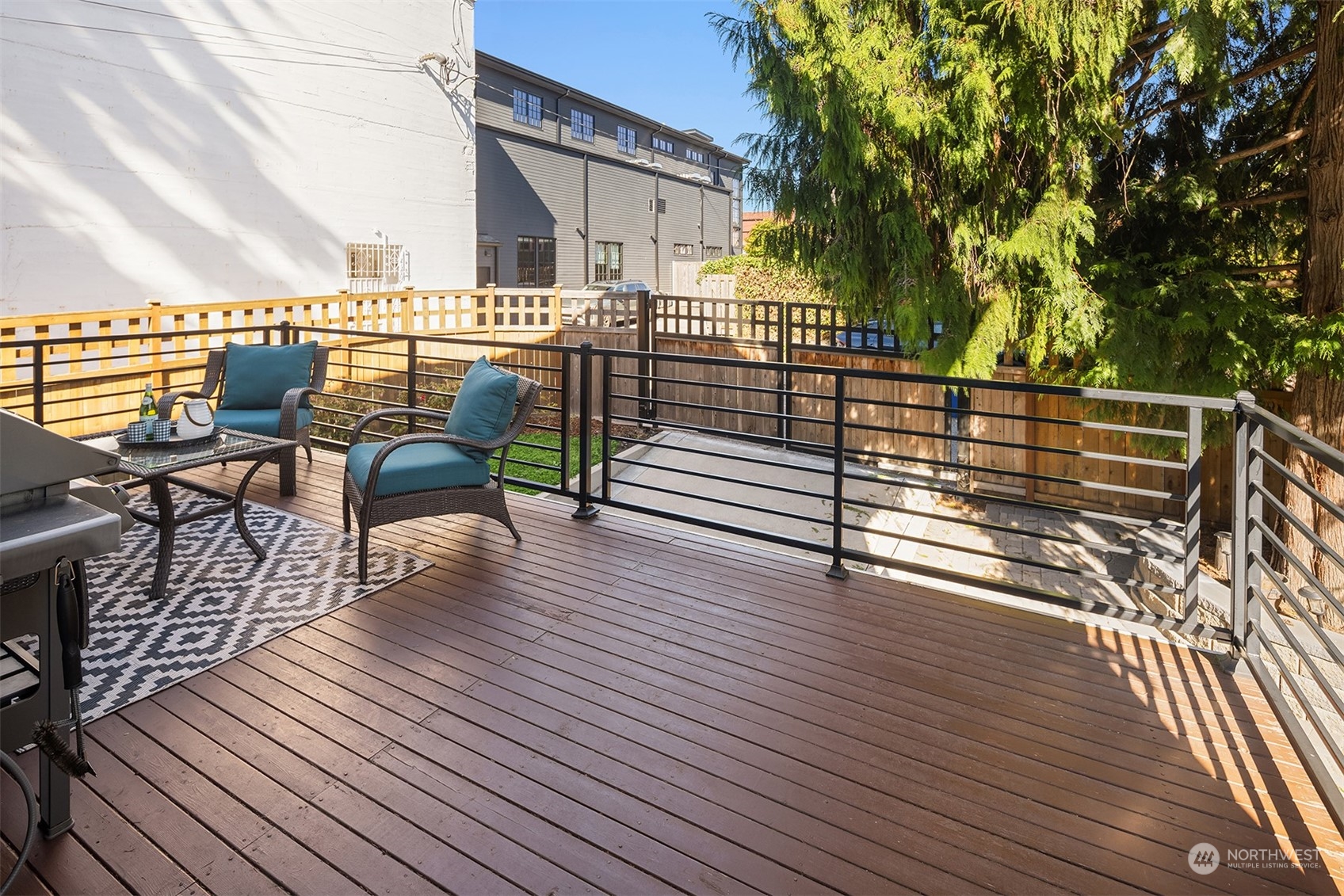 1112 North 76th Street Seattle, WA 98103 - Photo 16 of 40 a view of a balcony with chairs