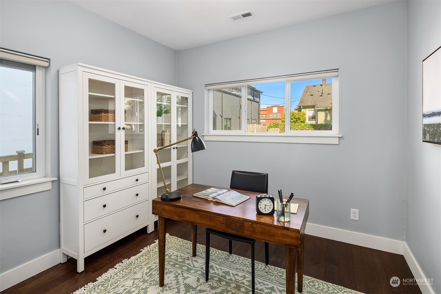 1112 North 76th Street Seattle, WA 98103 - Photo 17 of 40 a view of a workspace with furniture