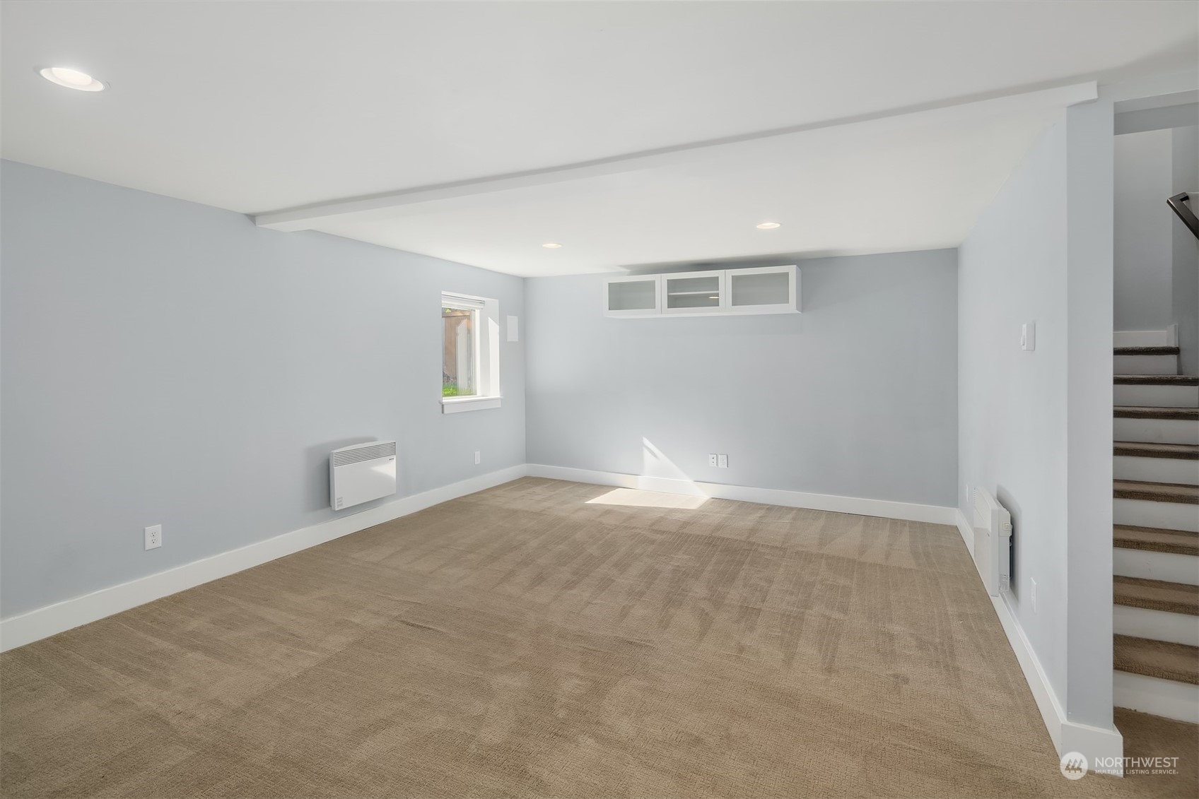 1112 North 76th Street Seattle, WA 98103 - Photo 25 of 40 an empty room with windows