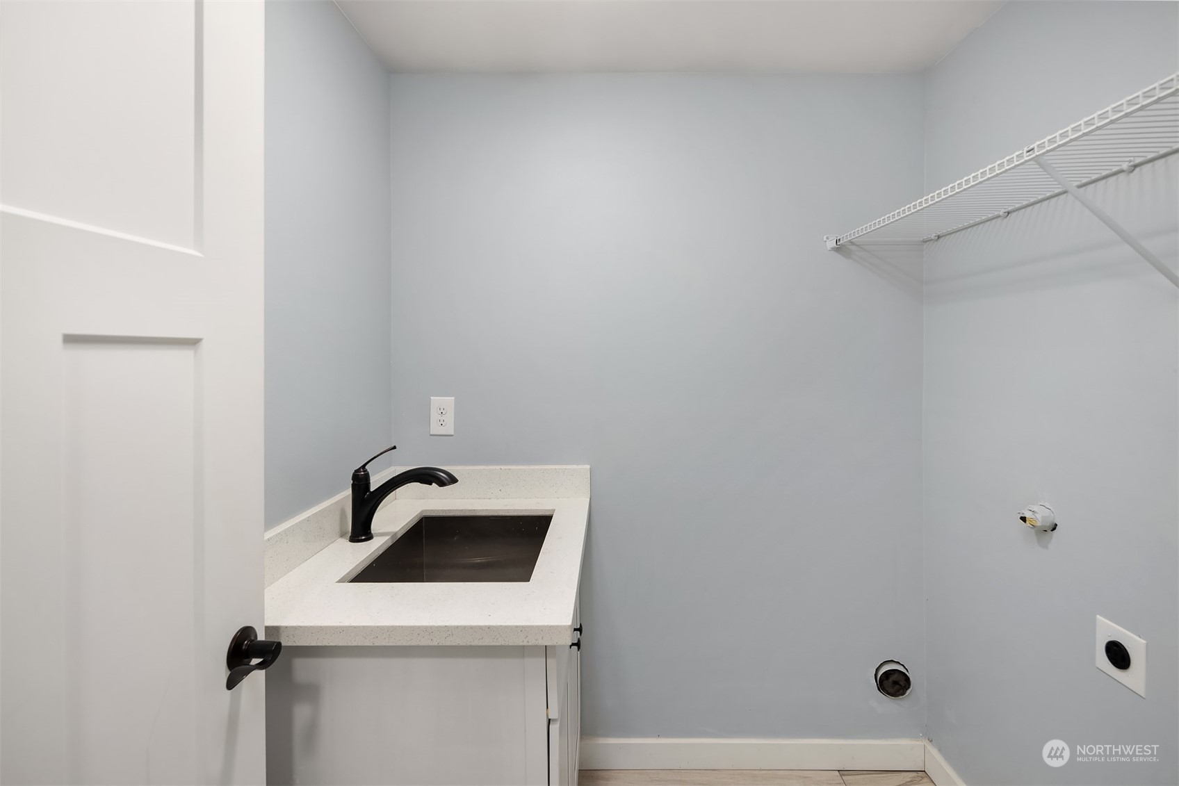 1112 North 76th Street Seattle, WA 98103 - Photo 29 of 40 a bathroom with a sink and shower