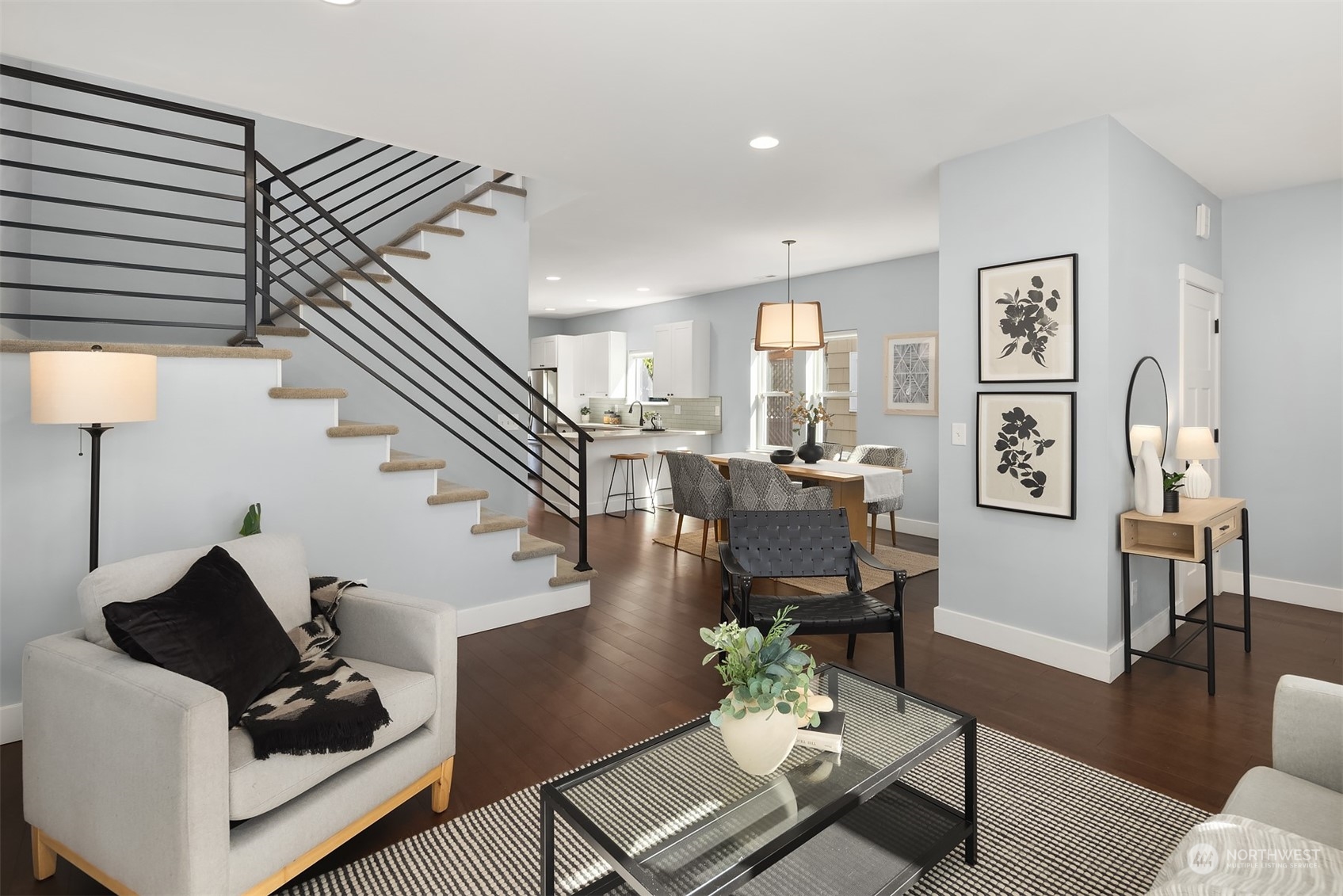 1112 North 76th Street Seattle, WA 98103 - Photo 5 of 40 a living room with furniture and wooden floor