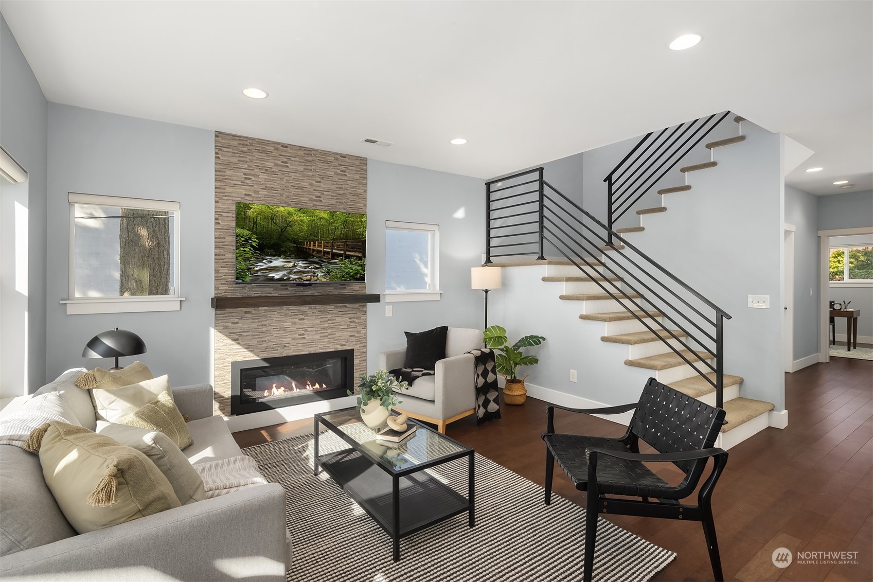 1112 North 76th Street Seattle, WA 98103 - Photo 6 of 40 a living room with furniture and a fireplace