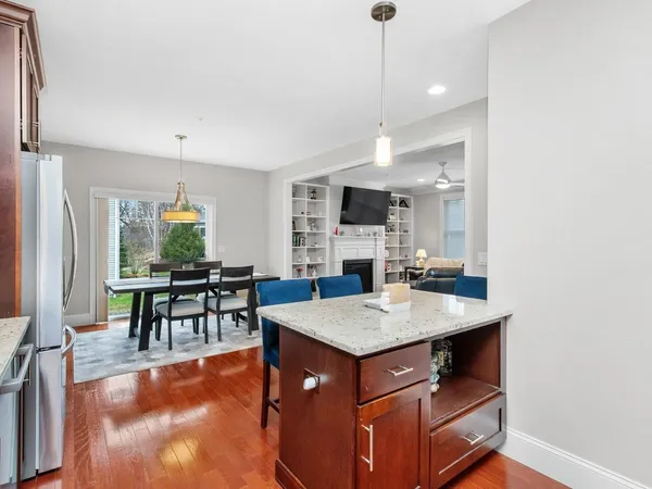 a view of kitchen island dining table and chairs