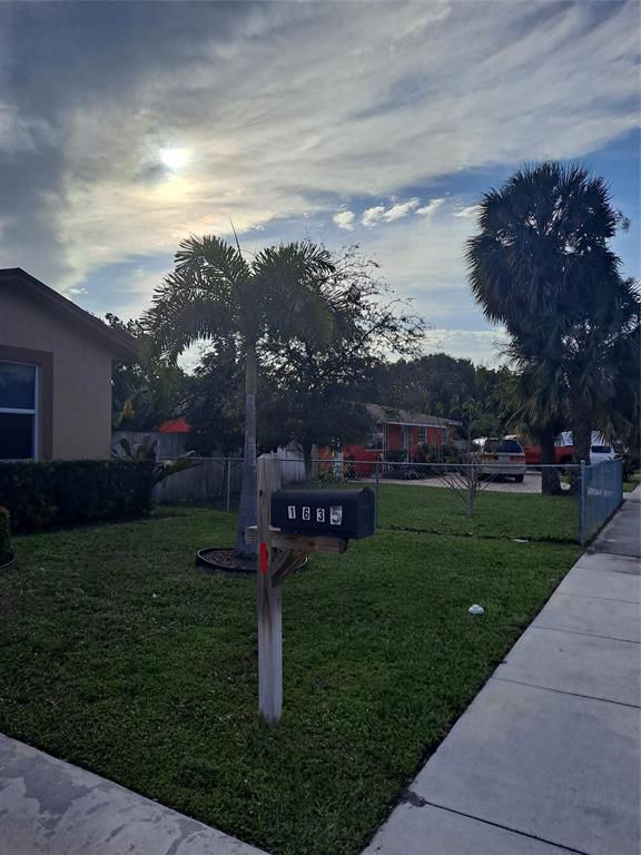 1635 West 15th Street Riviera Beach, FL 33404 - Photo 21 of 26 a view of a park with a house in the background