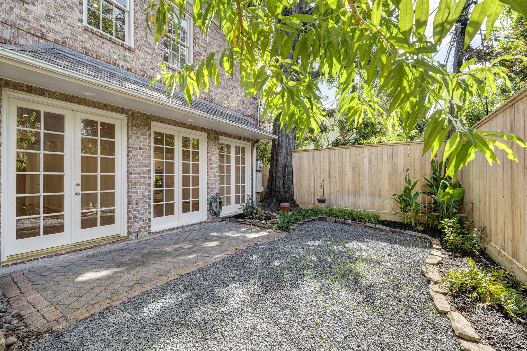 2709 Wroxton Road West University Place, TX 77005 - Photo 19 of 19 a view of a house with a yard