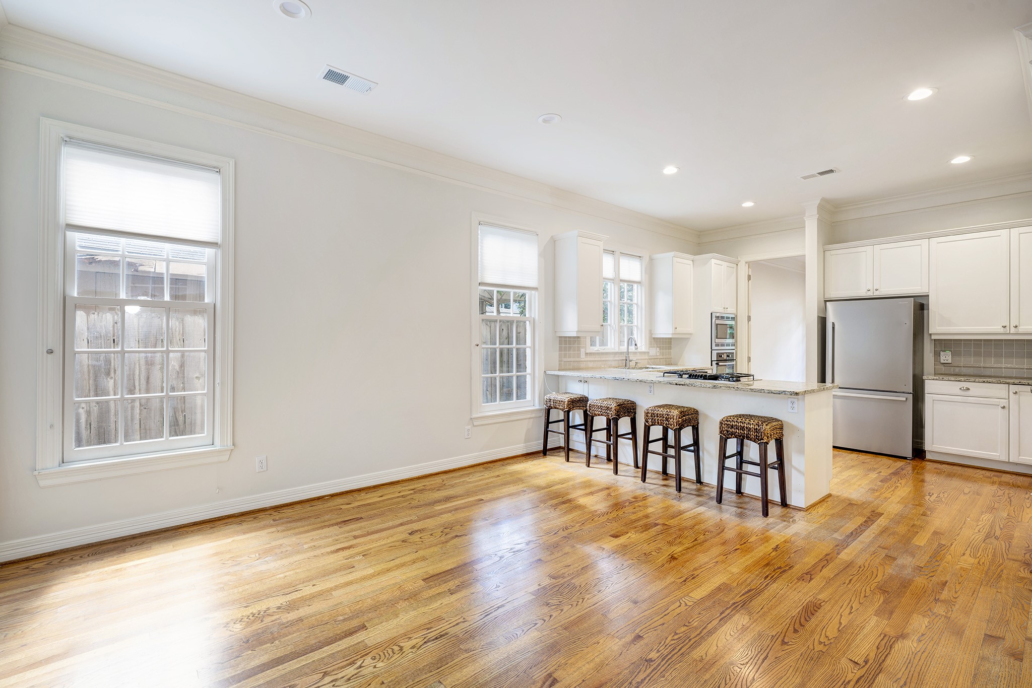 2709 Wroxton Road West University Place, TX 77005 - Photo 5 of 19 a view of kitchen with stainless steel appliances granite countertop a stove top oven a sink and a refrigerator