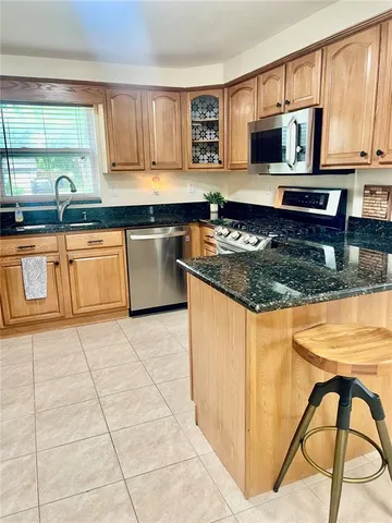 a bedroom with a bed and a cabinets