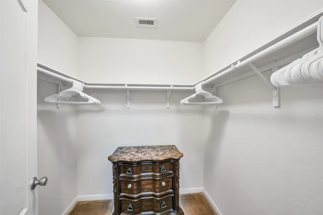 a view of a room with racks on the wall