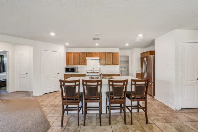 a view of a dining room with furniture