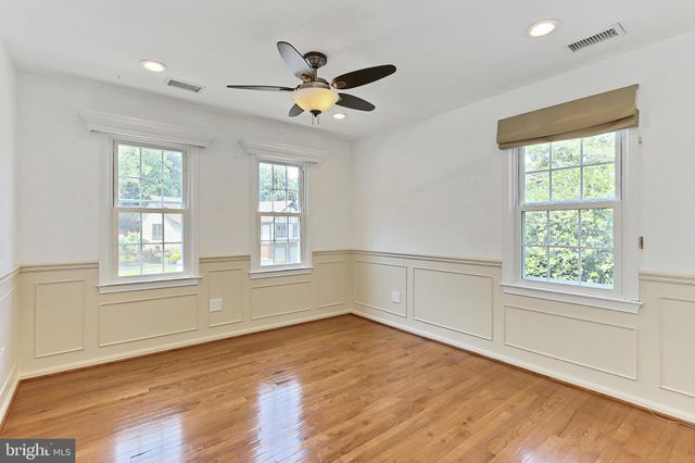a bathroom with a bathtub and a sink