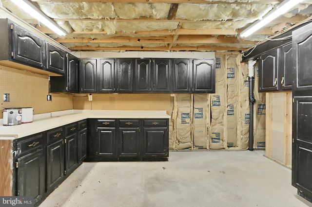 a view of a balcony with wooden floor