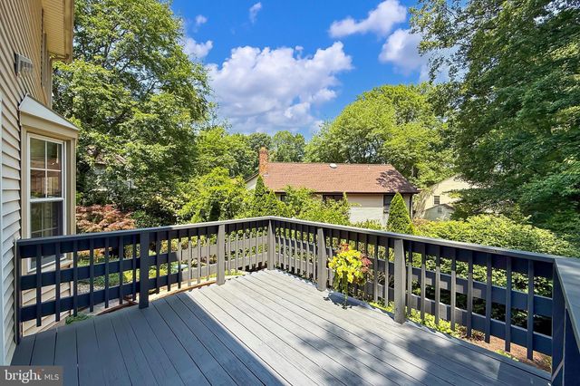 a view of balcony with wooden floor