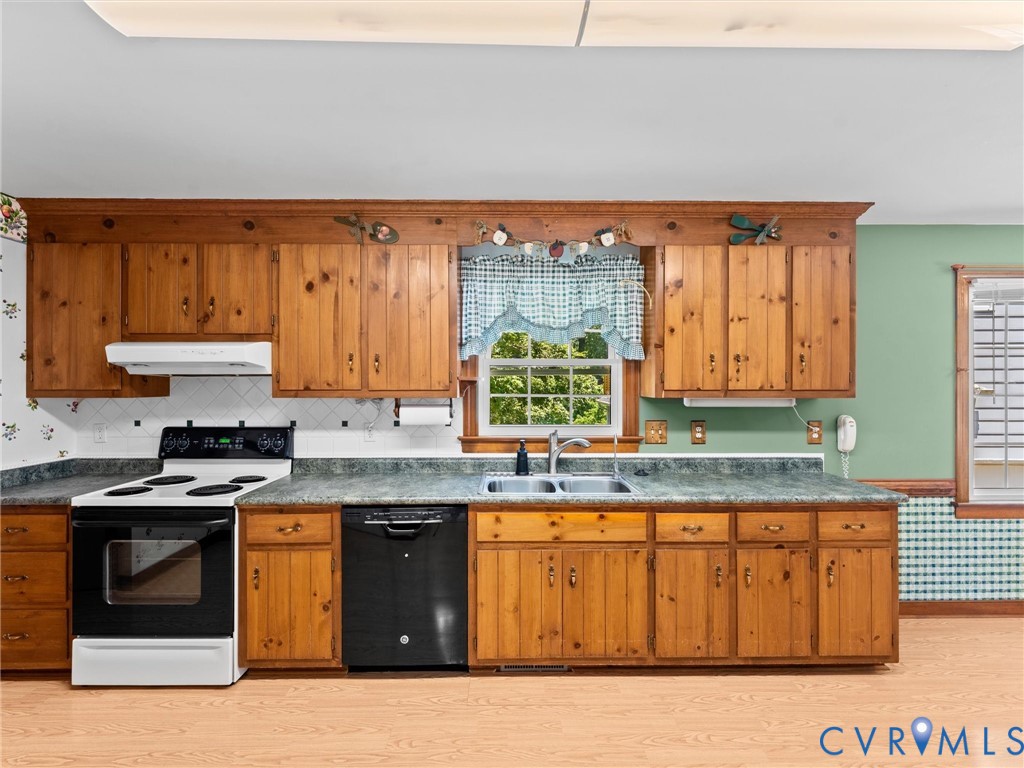 3524 Ludgate Road Chester, VA 23831 - Photo 15 of 44 Kitchen featuring wood cabinetry, laminate counter