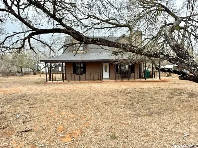 a view of a house with a snow in the yard