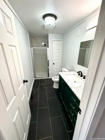 a bathroom with a sink a vanity and a mirror