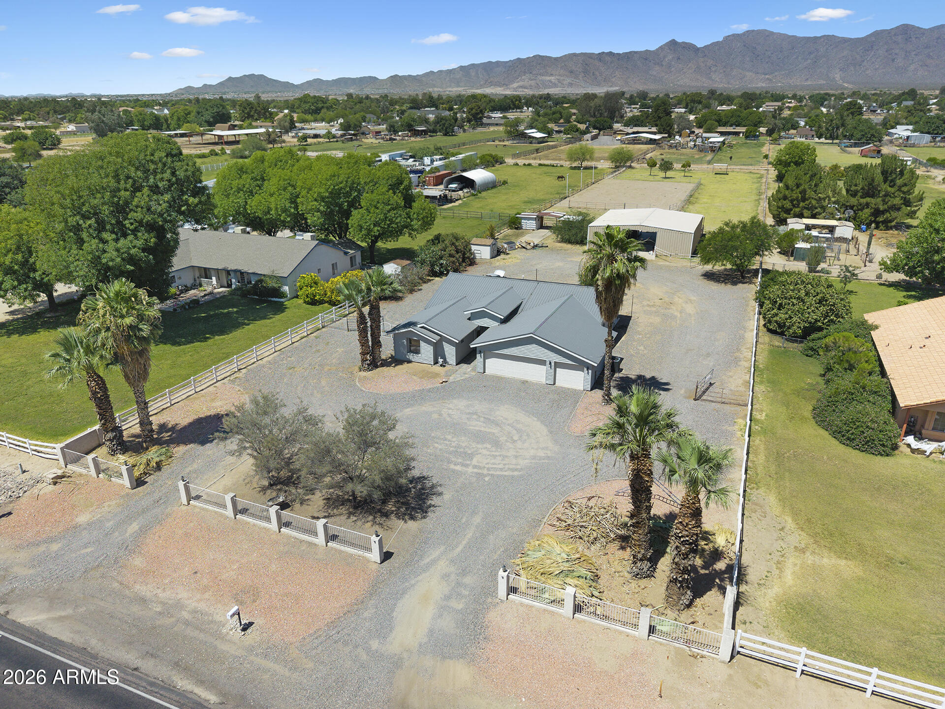 7624 North Citrus Road Waddell, AZ 85355 - Photo 51 of 57 a view of a lake with a yard