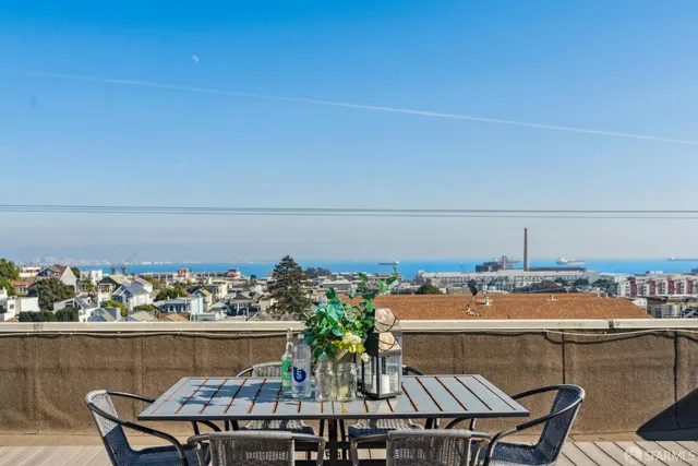 a view of a chairs and table on the terrace