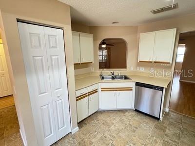 9759 Southwest 97th Lane Ocala, FL 34481 - Photo 15 of 28 a spacious bathroom with a granite countertop sink and a mirror
