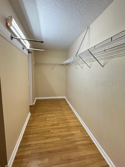 9759 Southwest 97th Lane Ocala, FL 34481 - Photo 20 of 28 a view of a room with racks on the wall