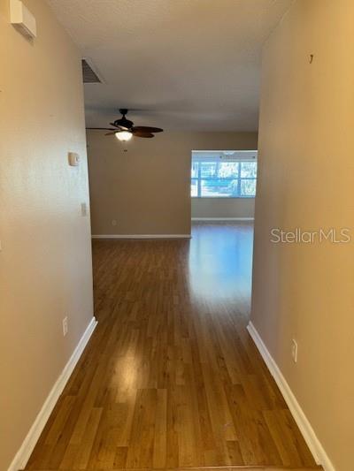 9759 Southwest 97th Lane Ocala, FL 34481 - Photo 4 of 28 a view of empty room with wooden floor