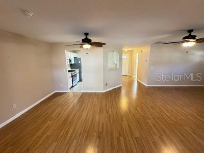 9759 Southwest 97th Lane Ocala, FL 34481 - Photo 6 of 28 a view of empty room with wooden floor