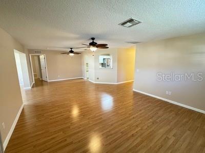 9759 Southwest 97th Lane Ocala, FL 34481 - Photo 7 of 28 a view of a livingroom with wooden floor