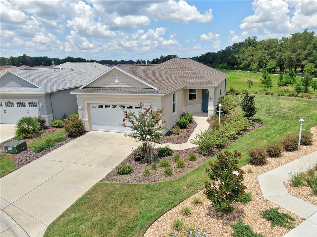7781 Southwest 86th Loop Ocala, FL 34476 - Photo 1 of 1 a front view of a house with a yard