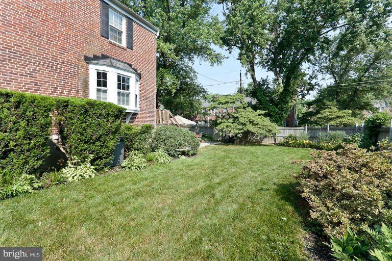 182 Brandon Road Baltimore, MD 21212 - Photo 11 of 30 a view of a house with a yard and sitting area