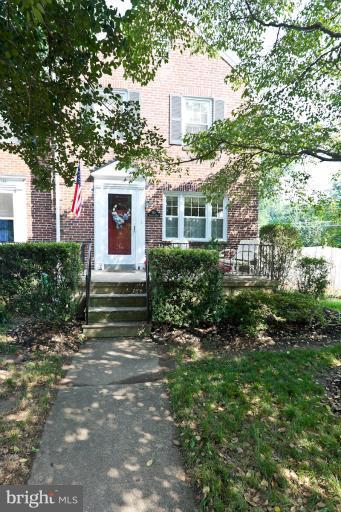 182 Brandon Road Baltimore, MD 21212 - Photo 16 of 30 a front view of a house with a yard