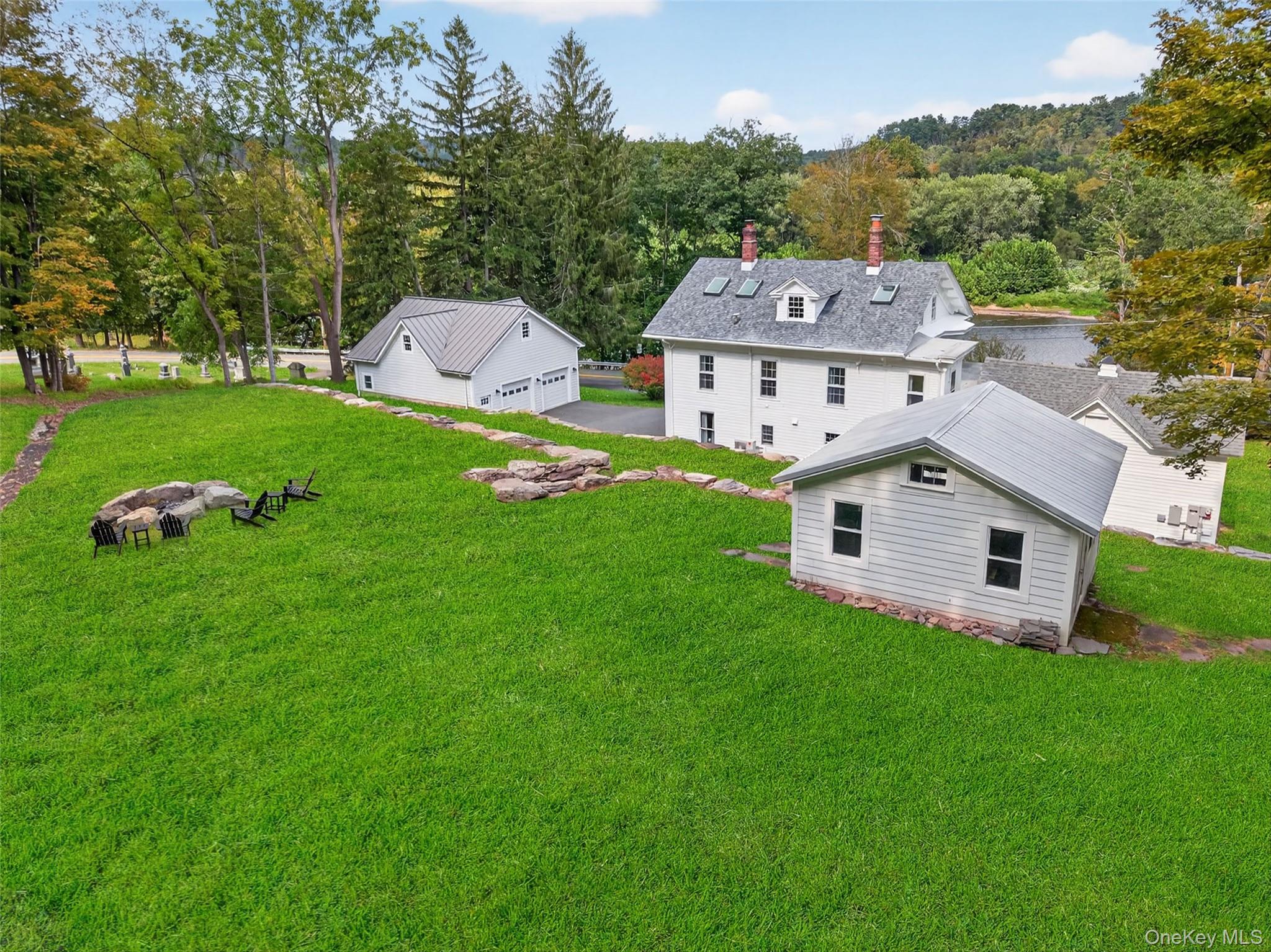 1657 River Road Damascus, PA 18415 - Photo 42 of 43 a aerial view of a house with backyard