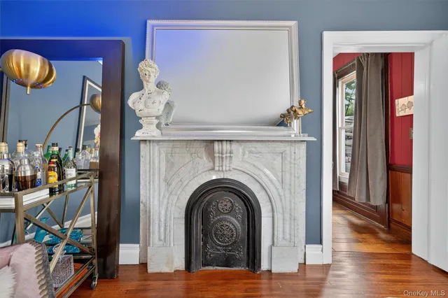 a view of livingroom with furniture and workspace