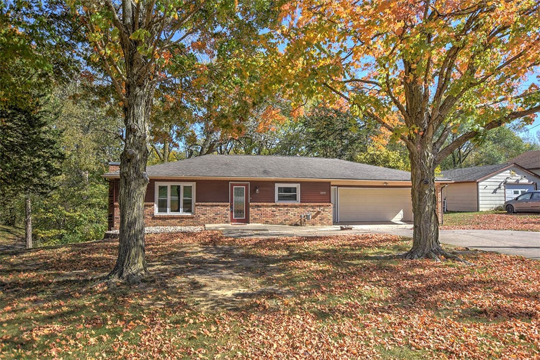 3970 Mount Zion Road Decatur, IL 62521 - Photo 25 of 36 a house that has a tree in front of it