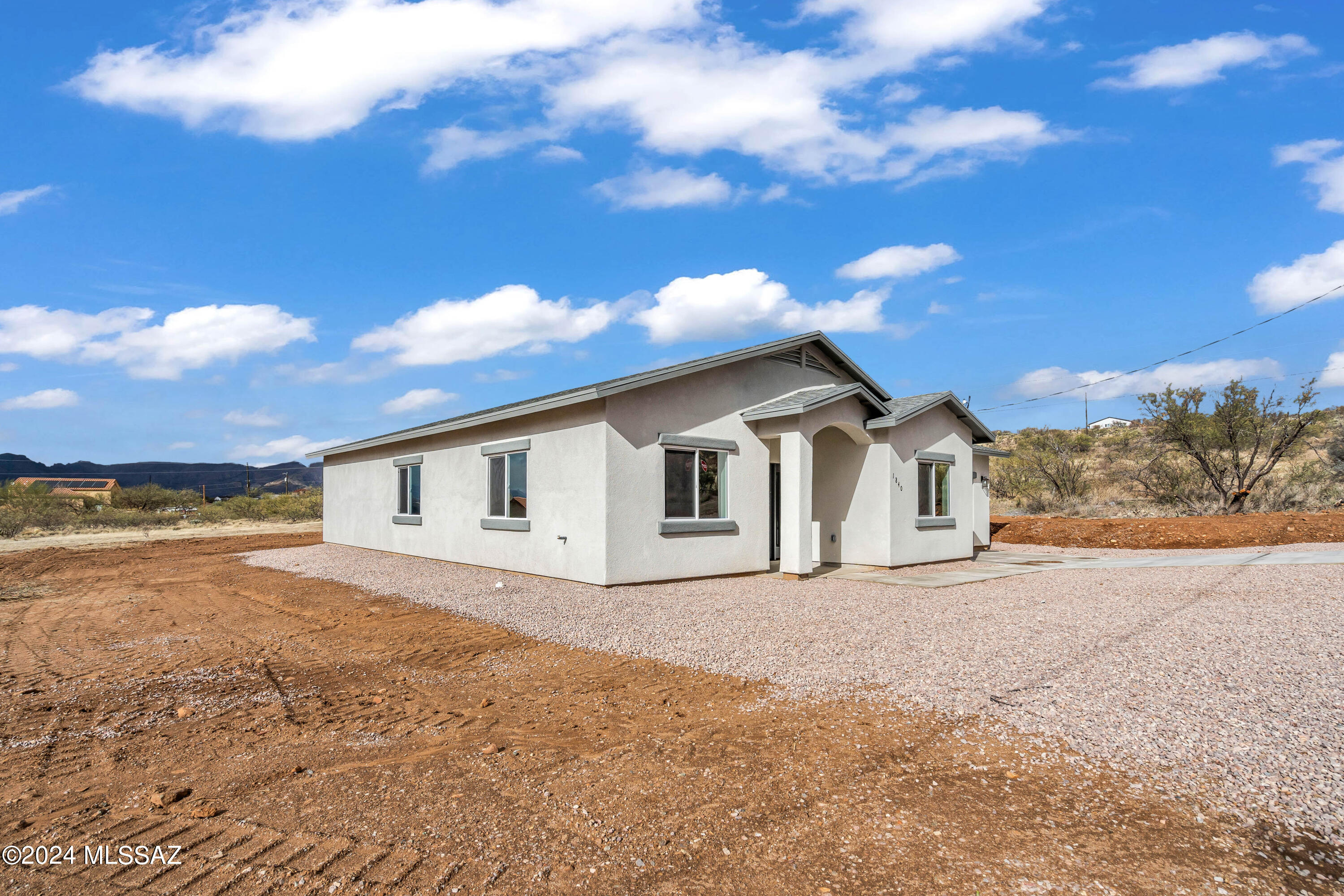 1840 La Paz Court Rio Rico, AZ 85648 - Photo 2 of 25 a view of a house with a yard
