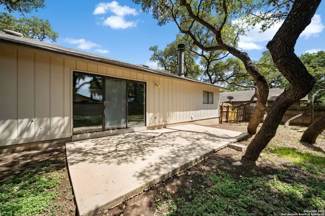 a view of a backyard of the house