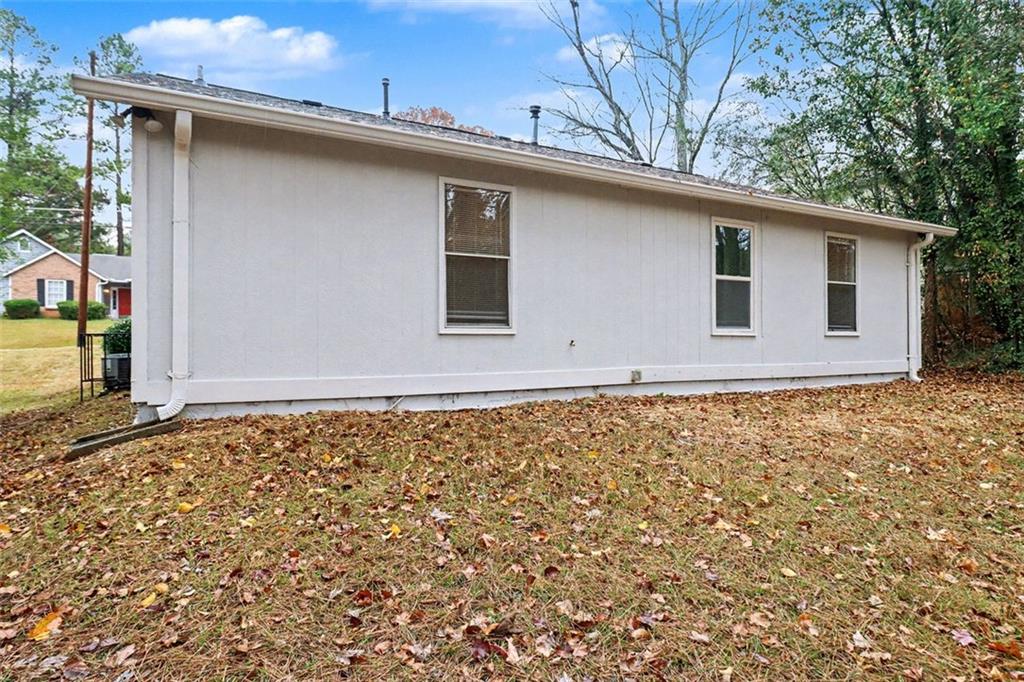 5474 Panola Downs Road Lithonia, GA 30058 - Photo 25 of 27 a backyard of a house