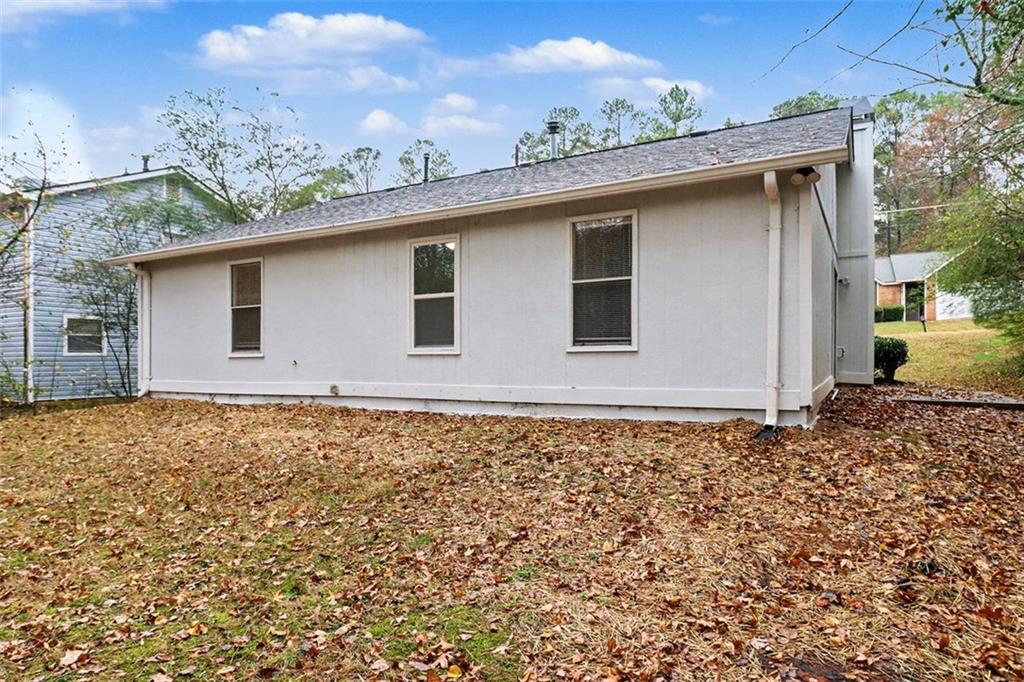 5474 Panola Downs Road Lithonia, GA 30058 - Photo 26 of 27 a house with a outdoor space