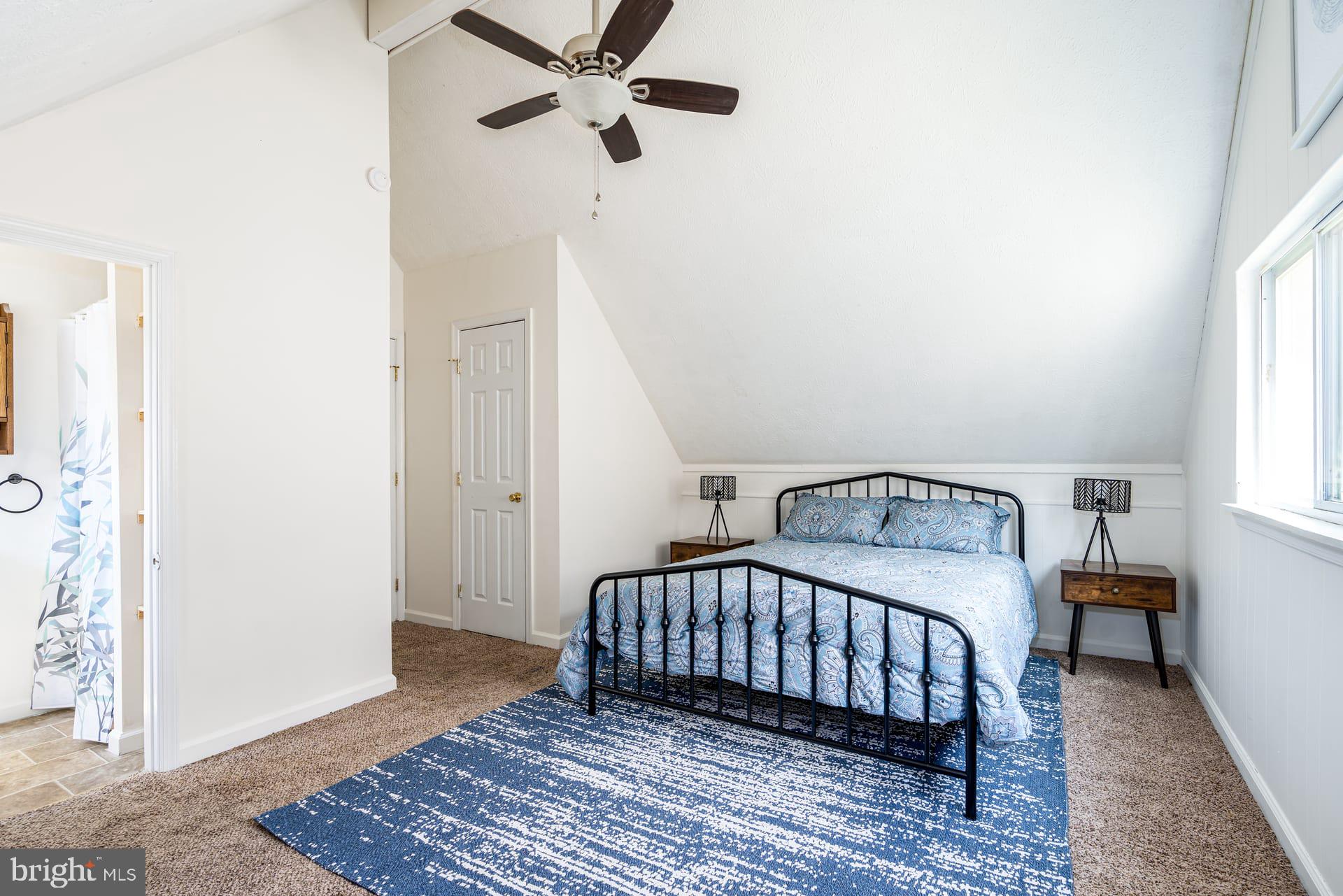 1125 Nancy Jack Road Gerrardstown, WV 25420 - Photo 14 of 24 a bedroom with a bed and wooden floor